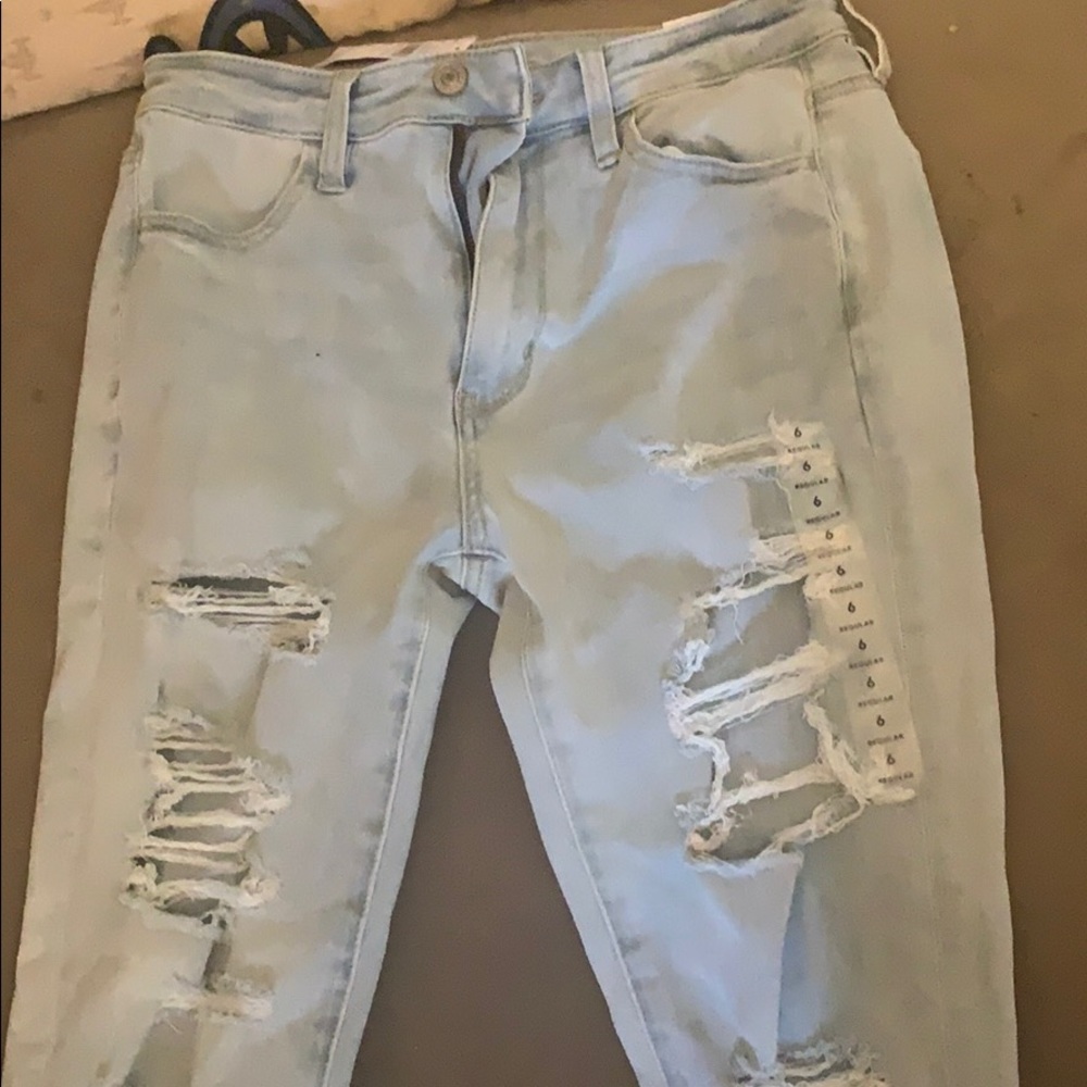 blue ripped jeans